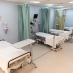 What is the role of an oxygen saturation monitor in monitoring a patient’s health?